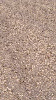 Vertical Video of a Field with Plowed Land in Autumn Slow Motion