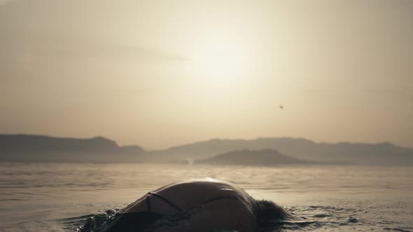 Slow Motion Video of a Girl Splashing Water on Her Hair