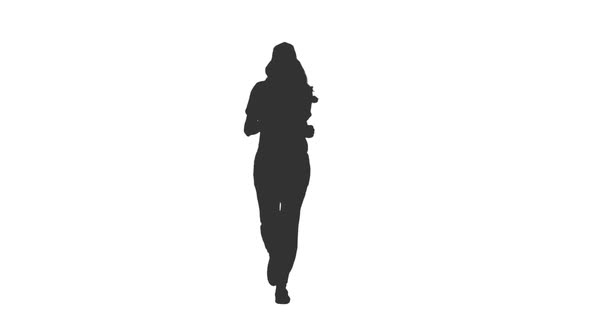 Silhouette of Jogging Young Woman With Long Hair 