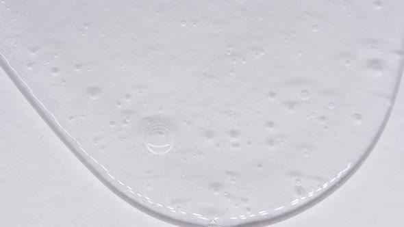 Transparent Space Liquid is Filled with Drops of Red Blue Yellow and Green Paint