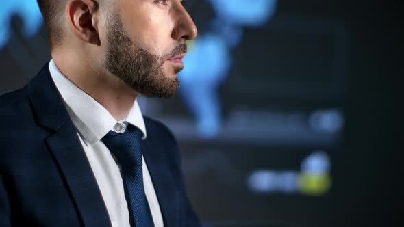 Closeup Bearded Business Man in Suit Tie Brainstorming at Infographic Scheme Global Map Screen