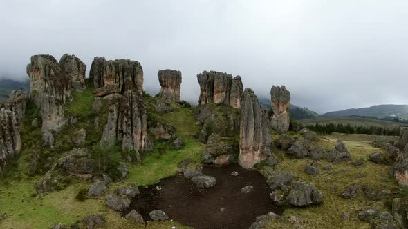 Beautiful Stone Forest Of Los Frailones On Green Hill In Cumbemayo At Cajamarca City, Peru. aerial