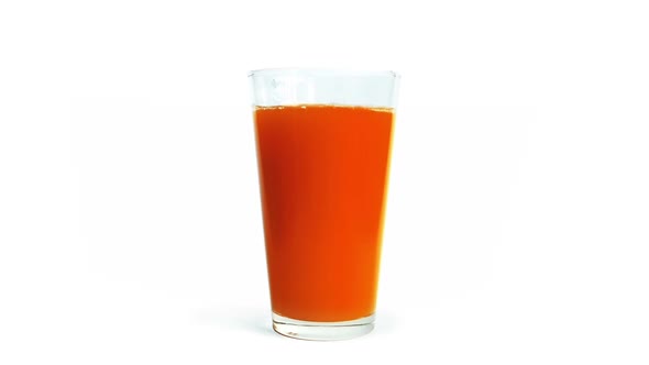 Tomato Juice Pours Into Glass