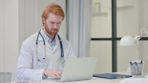 Redhead Male Doctor Showing No Sign By Finger