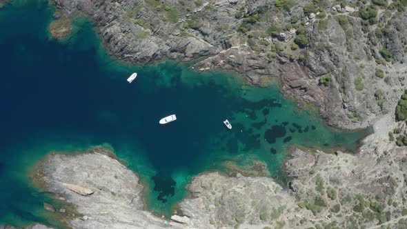 Drone Shot of Yachts in Beautiful Bay Among Rocks