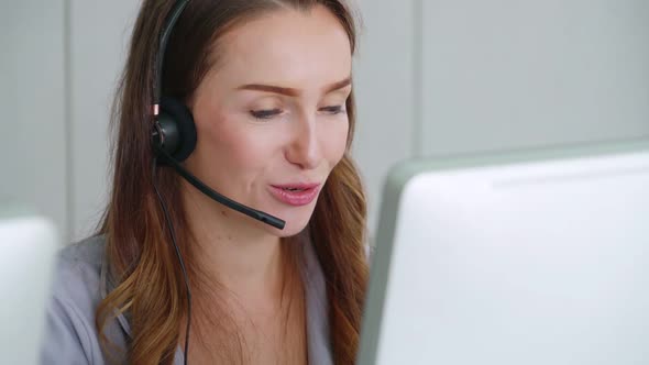 Business People Wearing Headset Working in Office