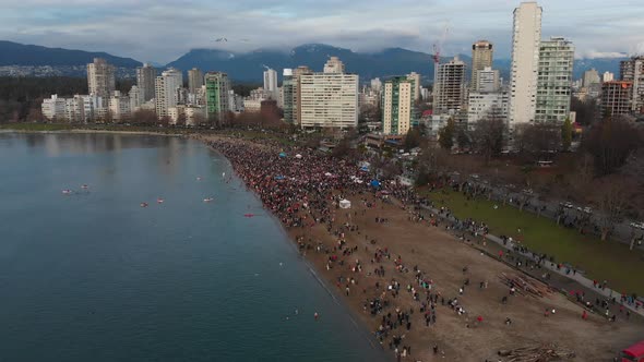 Various drone shots at English Bay near downtown Vancouver, BC during Polar Bear 2019 event