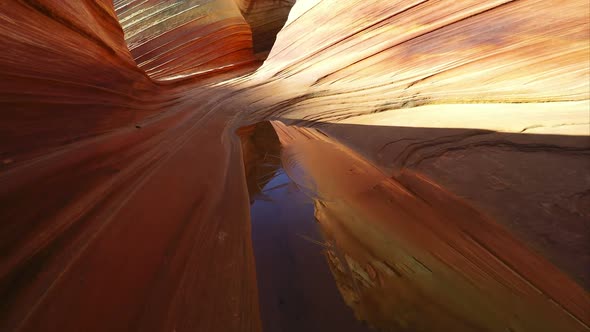 Gliding view over a pool of water in the Wave.