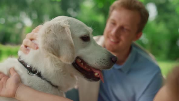 Happy Dog Enjoy Caressing on Picnic Close Up