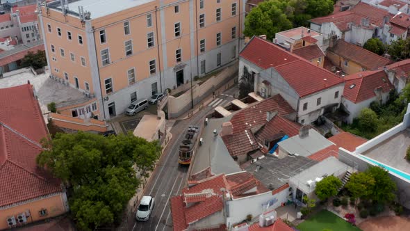 Aerial View of Tramway Driving in Town Streets