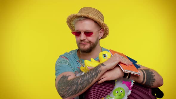 Displeased Tired Boring Traveler Tourist Bearded Stylish Man in Summer Clothes on Yellow Background