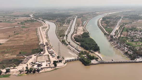 Aerial View Chenab River With Beside Head Panjnad Bridge In Bahawalpur, Punjab. Orbit Motion