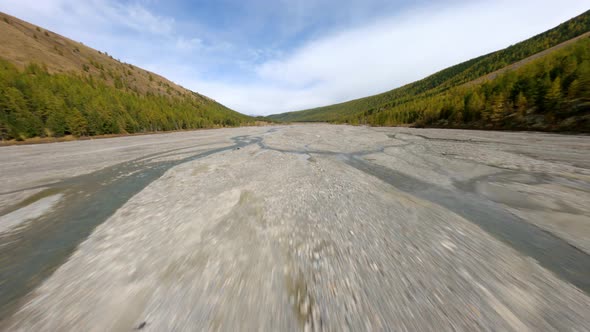 Speed Low Flying Aerial View Riverbed Mountain Snow Summit Natural Creek Stream