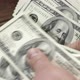counting a pack of 100 dollar bills - VideoHive Item for Sale