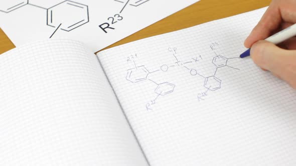 Chemistry Student Drawing A Formula