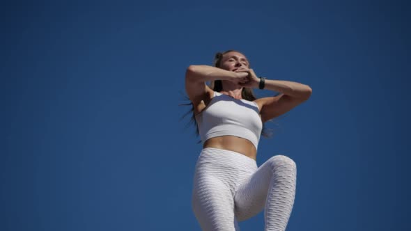 Young Girl Performs Energy-intensive Exercise on a Hot Day