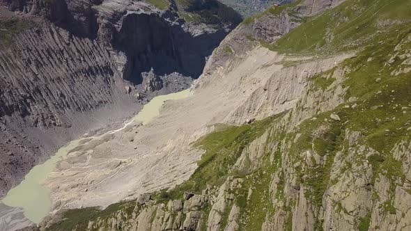 Aerial shot of a wild transformed valley in the Swiss alps in the Grindelwald region