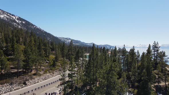 Lake Tahoe Scenic Drive with majestic pines and snow-capped mountains