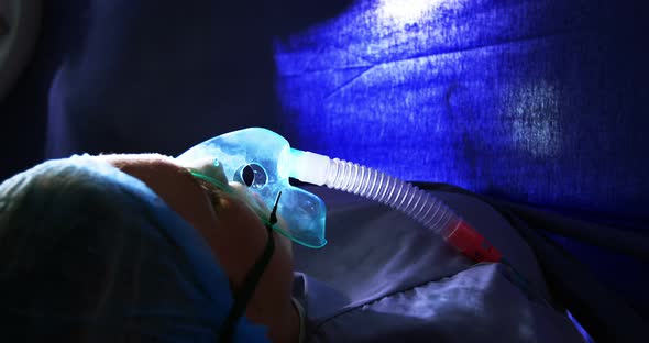 Pregnant woman lying on operation bed