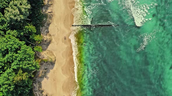 Waves on Batlic sea. Vacation at seaside. Aerial view, Poland.