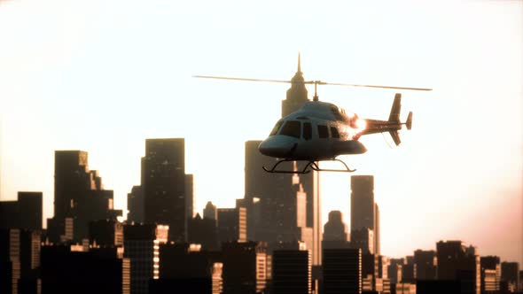 Silhouette Helicopter at City Scape Background