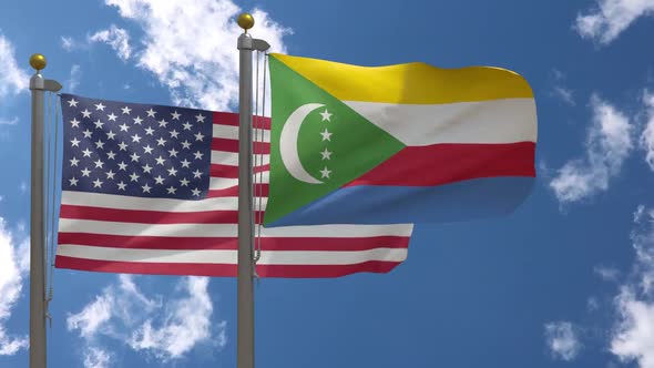 Usa Flag Vs Comoros Flag On Flagpole