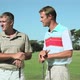 Mature men chatting on golf course - VideoHive Item for Sale