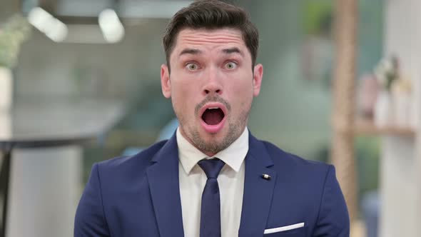 Attractive Businessman Feeling Shocked, Surprised 