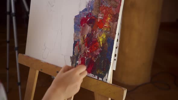 Woman Hand Using a Palette Knife Paint Colorful Picture Close Up Shot