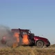 Car Explosion On The Road. Car Burning. Side View - VideoHive Item for Sale