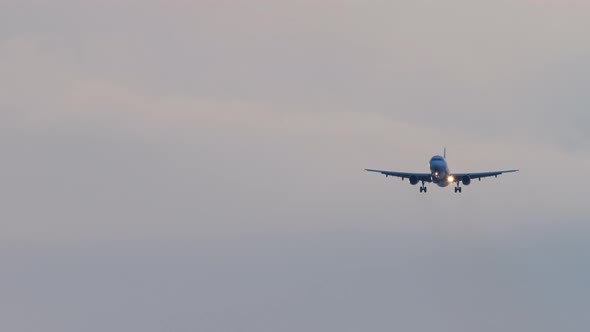 Airplane Approaching Over Ocean