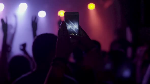 Footage of a Crowd Partying at a Rock Concert or Dj Party Slow Motion Shot