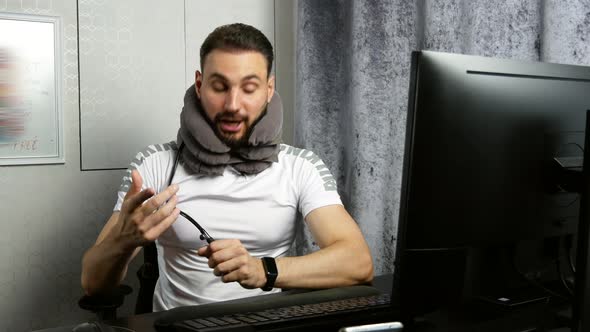 Young Bearded Business Coach Gives an Online Lesson About Medical Orthopedic Collar Neck Brace for