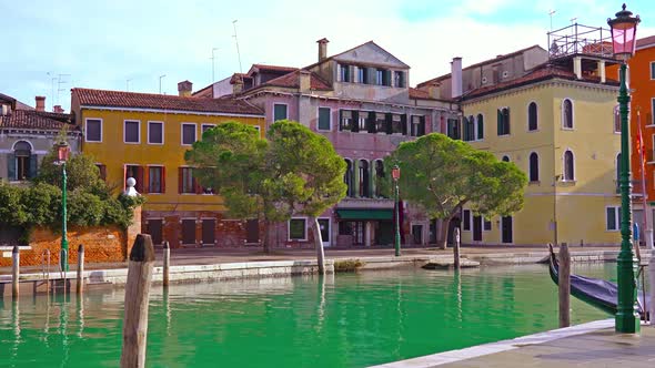 Venice City Old Colorful Buildings on Narrow Canal Bank