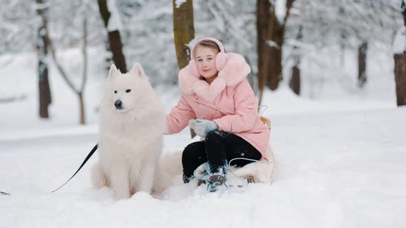 Girl with a Dog Samoyed