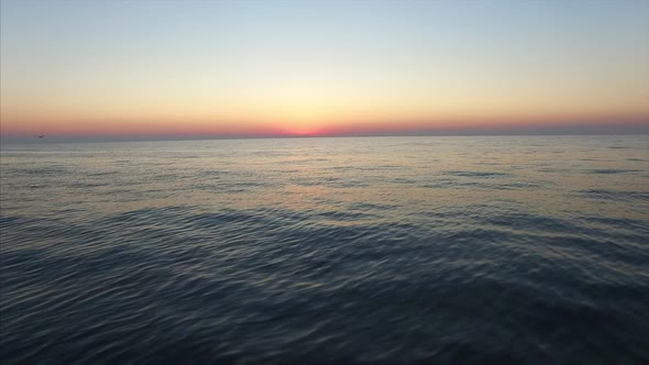 Flying across Lake Michigan at sunset