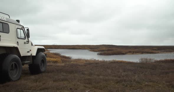 The Allterrain Vehicle Travels Through the Tundra to the Sea