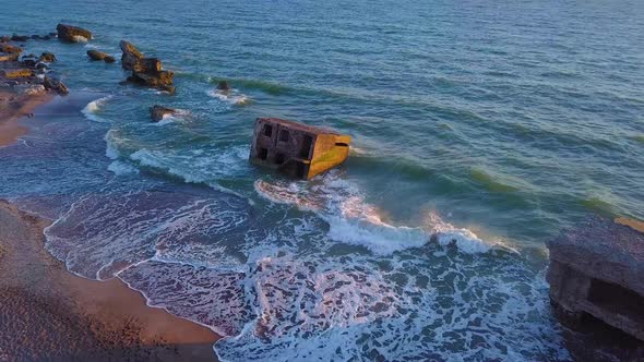 Aerial birdseye view of abandoned seaside fortification buildings at Karosta Northern Forts on the b