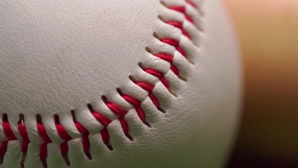 Close Up of Baseball Ball on Green Background