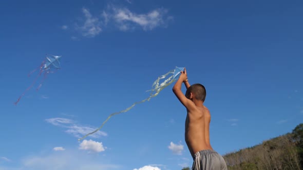 Asian Boy Playing With Kite