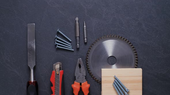 Red Set of Work Construction Tools on the Table