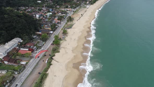 Brazilian Maresias beach landmark. Tropical summer beach.