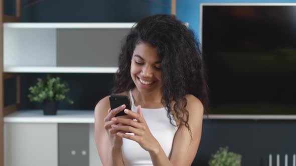 Portrait Beautiful Young African American Woman Using Smartphone Browsing Online Messages Smiling