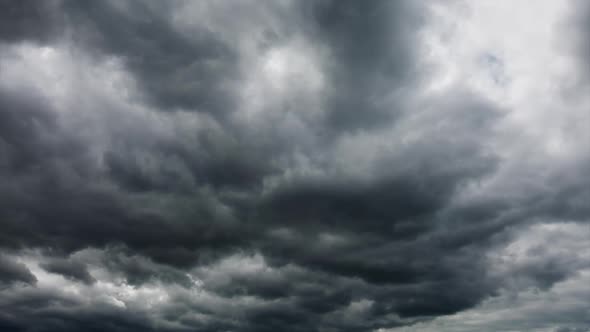 Majestic Gray Clouds Flying Over the Horizon