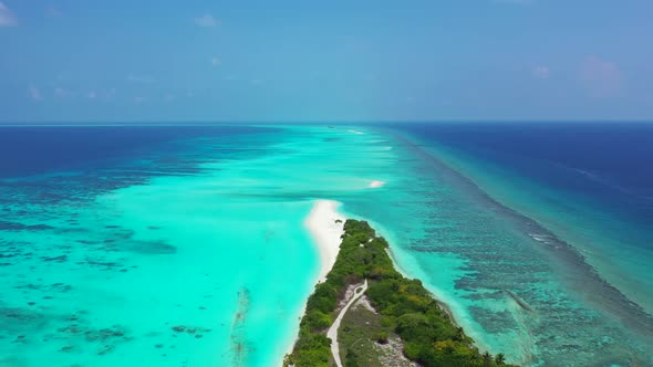 Aerial view travel of perfect resort beach vacation by aqua blue lagoon with white sand background o