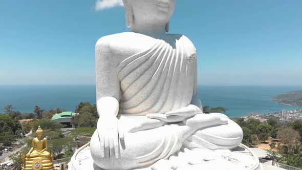 The Great Buddha of Phuket, seated Maravija Buddha statue in Phuket, Thailand. Pedestal shot 