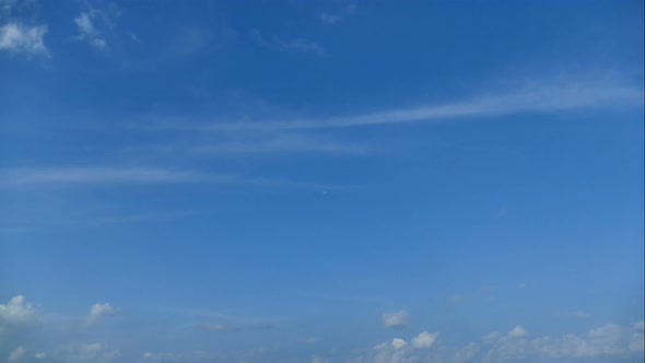 Time lapse of white cloud moving pass around sky background