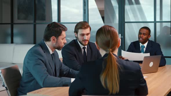 A group of people at a business meeting