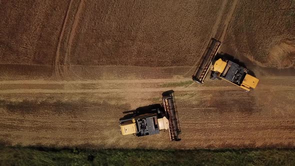 Top Down View of Combine Harvesters Agricultural Machinery. The Machine for Harvesting Grain Crops.