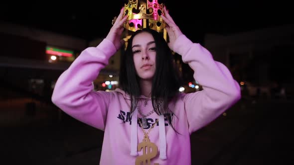 Bad girl wear crown at night city